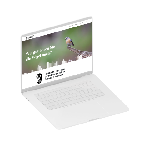 Aufgeklappter Laptop zeigt die Website von H&ouml;rger&auml;te Schedl