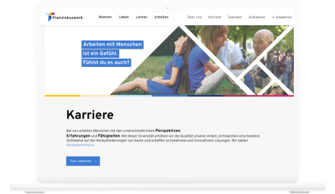 Laptop mit ge&ouml;ffneter Website des Franziskuswerks. Die Karriereseite zeigt ein Banner mit dem Text 'Arbeiten mit Menschen ist ein Gef&uuml;hl. F&uuml;hlst du es auch?' sowie eine Beschreibung der Arbeitskultur und einen Link zum Jobportal.